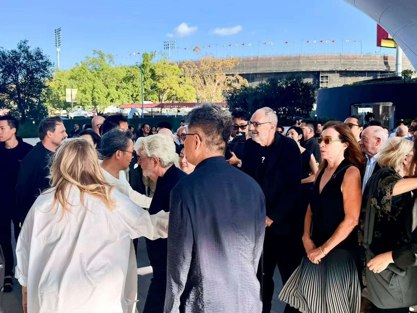 From left: Qingyun Ma, Lucas, Ma, and Thom Mayne at MAD Day